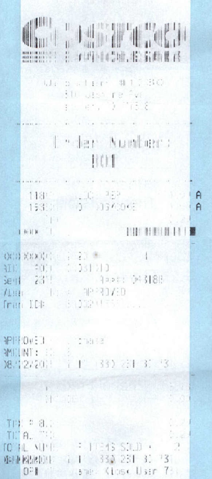 A real Costco receipt on thermal paper, faded almost completely blank.