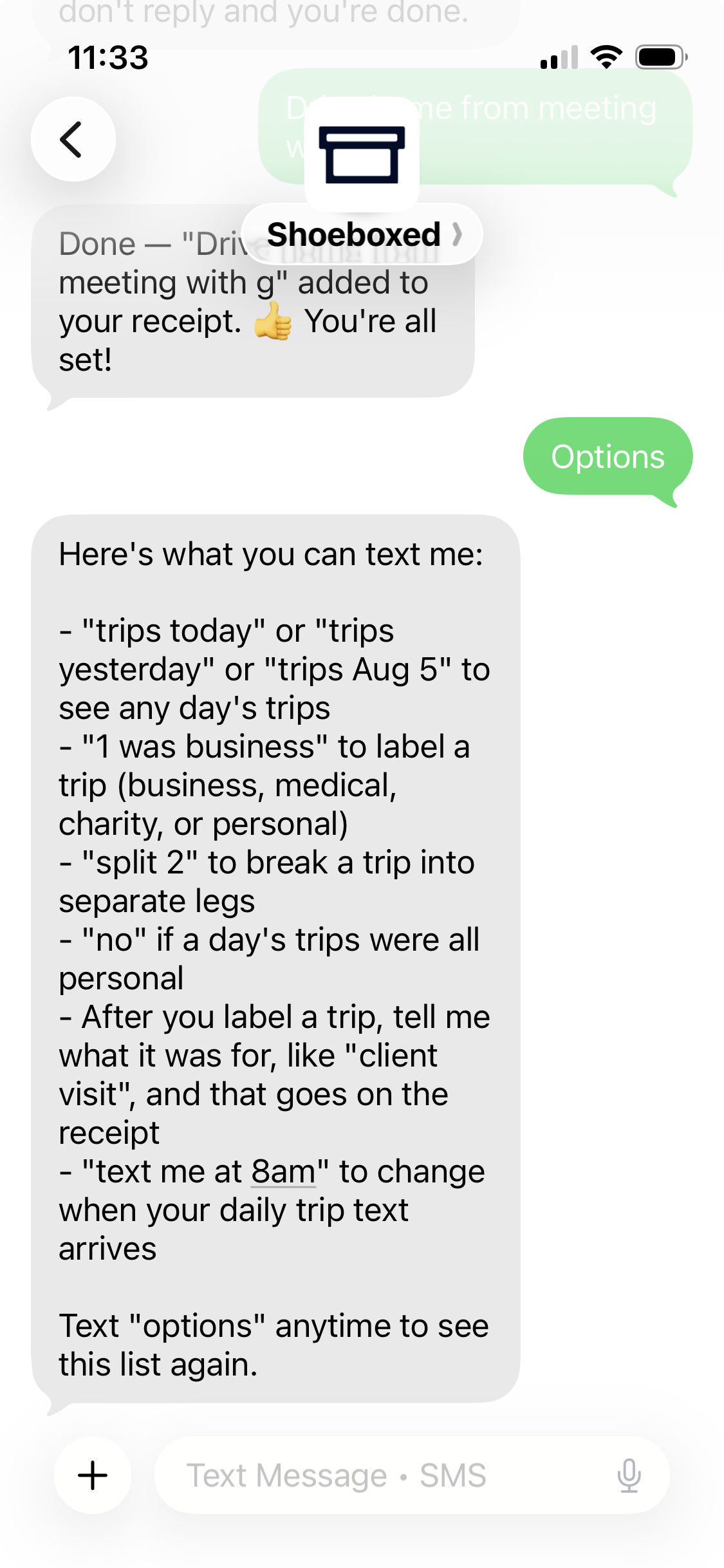 Real Shoeboxed mileage tracker text message listing everything you can text the tracker, including checking trips by date, labeling trips, splitting trips, and changing your text time