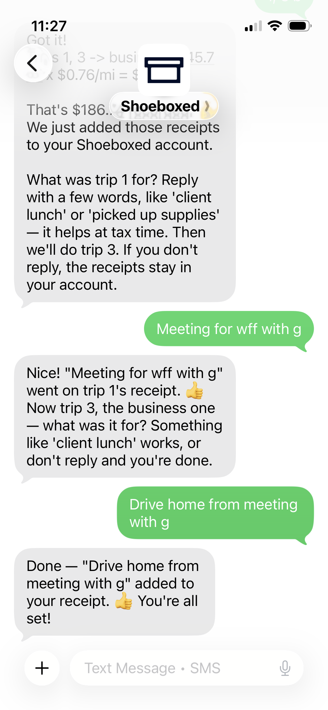Real Shoeboxed mileage tracker text message showing the split trip legs classified as business and labeled with their purpose, ending with confirmation the receipts are saved